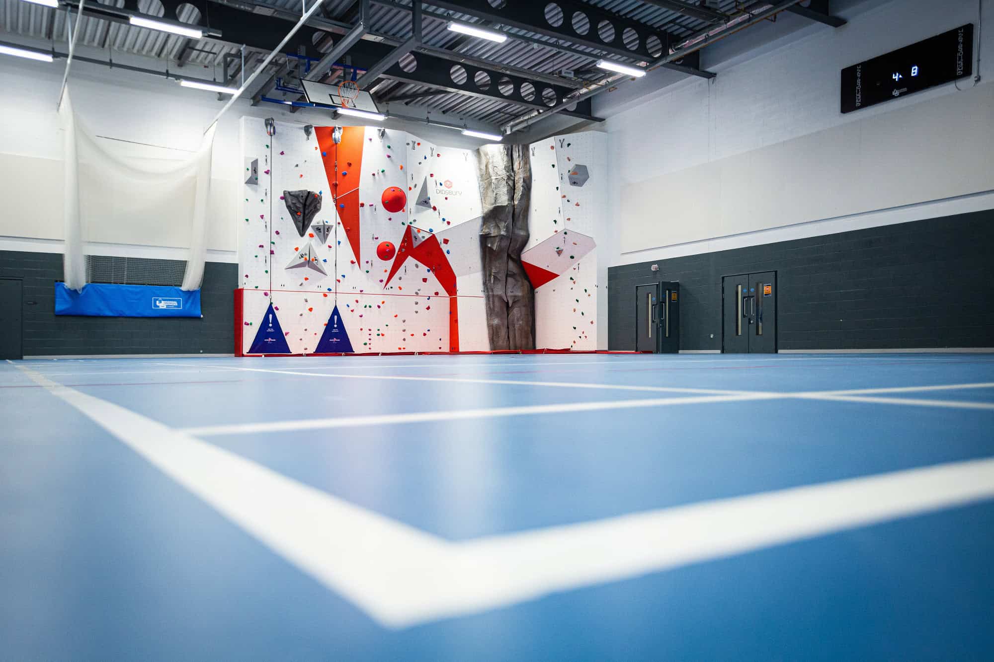 The Sports hall at Didsbury High School and Club Didsbury, featuring the climbing wall.