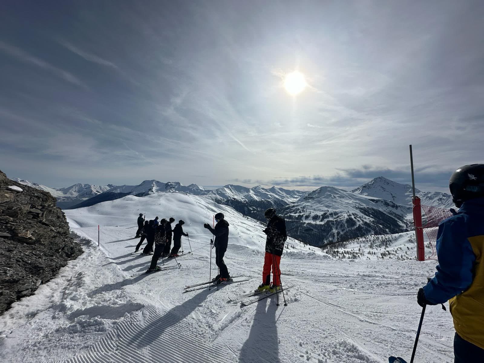 Didsbury High School students ski in the mountains.